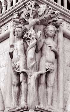 Sabian Symbol for Aries 14: A serpent coiling near a man and a woman.