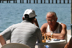 Sabian Symbol for Sagittarius 3: Two men playing chess.