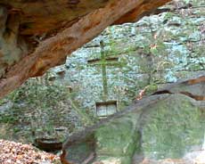 Sabian Symbol for Pisces 7: A cross lying on rocks.