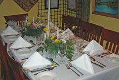 Sabian Symbol for Pisces 20: A table set for an evening meal.