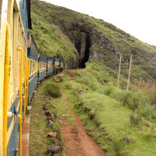 Sabian Symbol for Aquarius 14: A train entering a tunnel